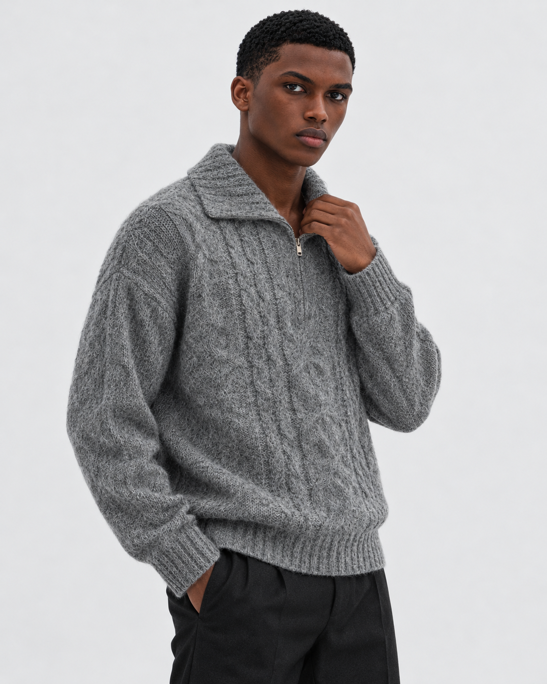 Gray | Model styling cable-knit half-zip sweater in an alternate pose