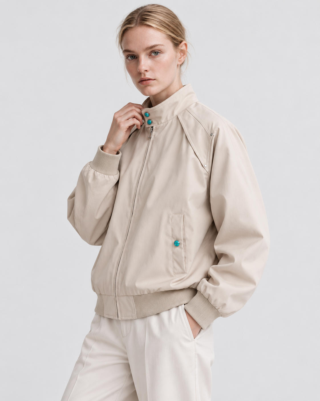 Color: Apricot | Men's apricot loose fit stand collar bomber jacket styled on model, look 2