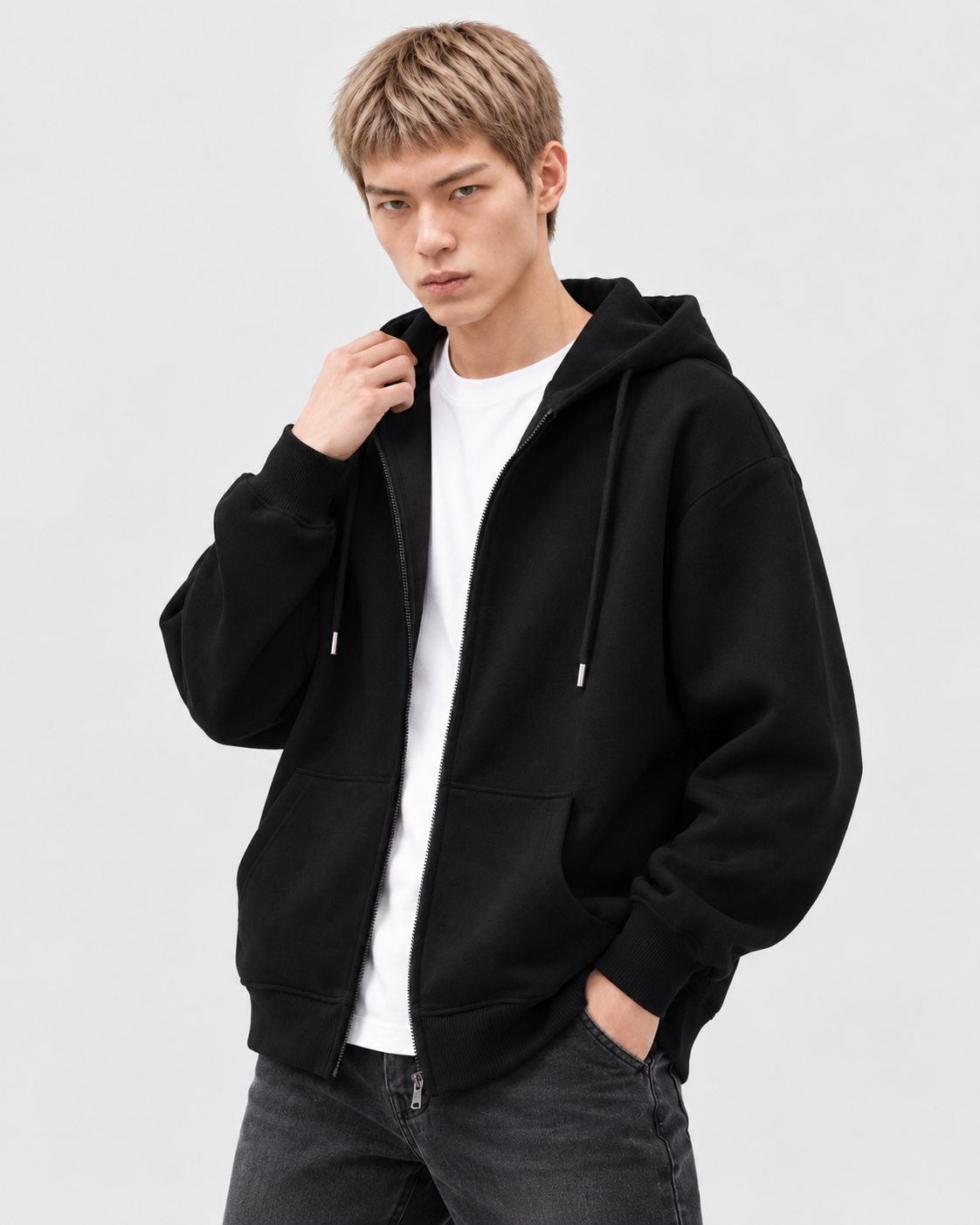 Image of Color: Black | Men's black heavyweight cotton blend zip-up hoodie styled on model, look 2