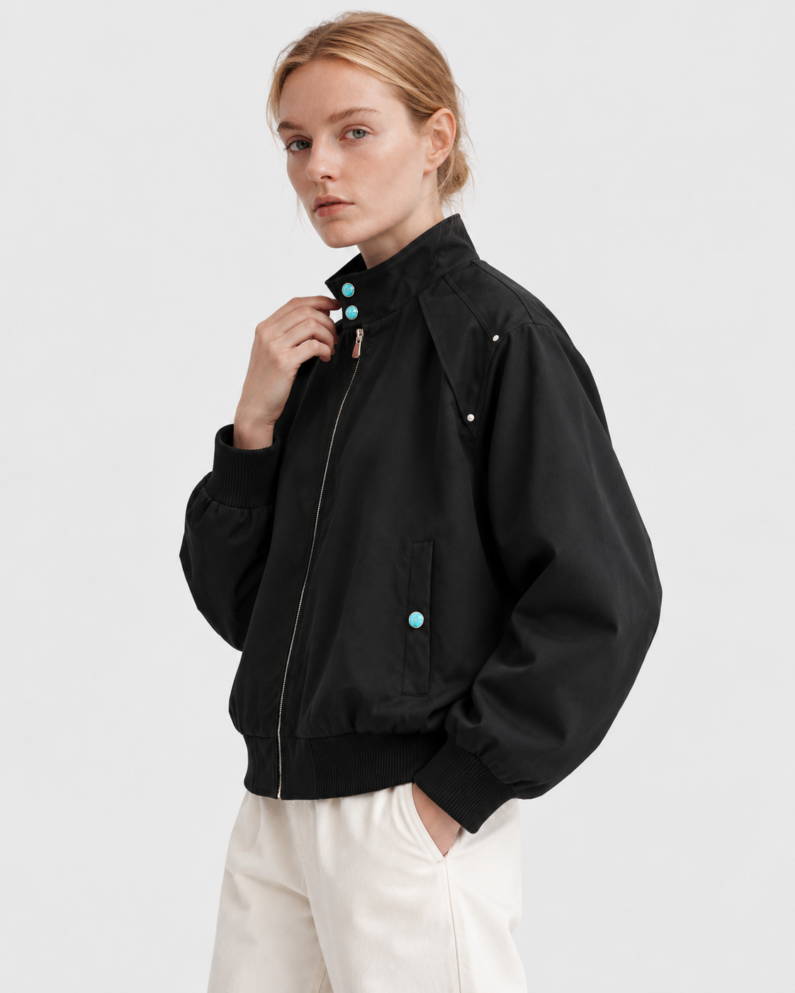 Color: Black | Men's black loose fit stand collar bomber jacket styled on model, look 2