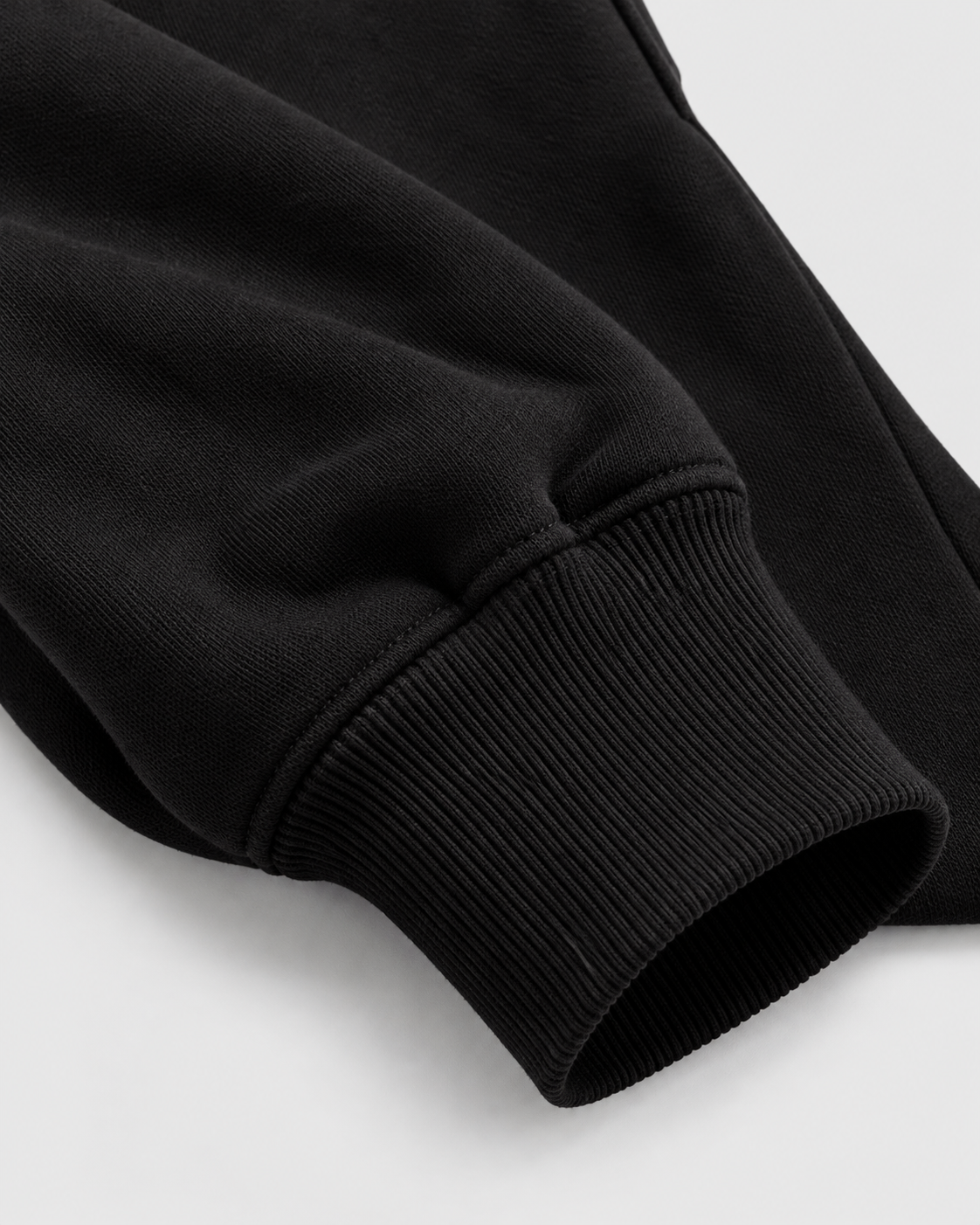 Image of Color: Active Black | Women's active black raw-edge cropped cotton pullover hoodie styled on model, look 2