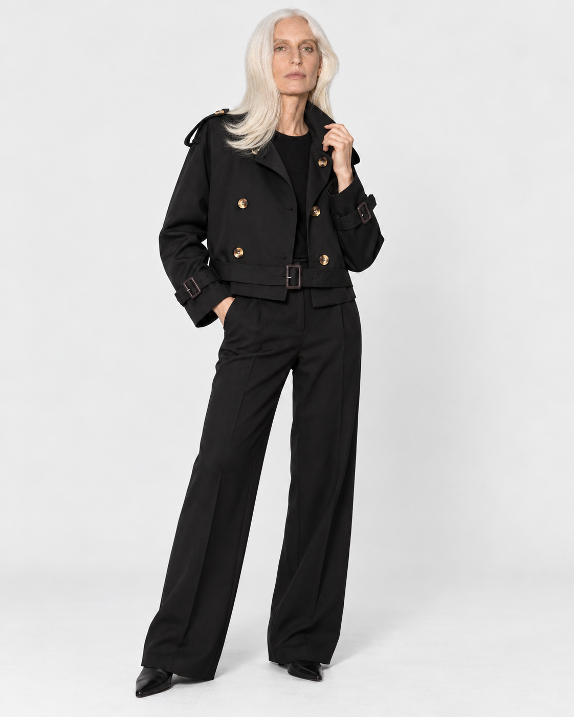 Color: Black | Women's black short double-breasted belted trench coat, studio product view 5