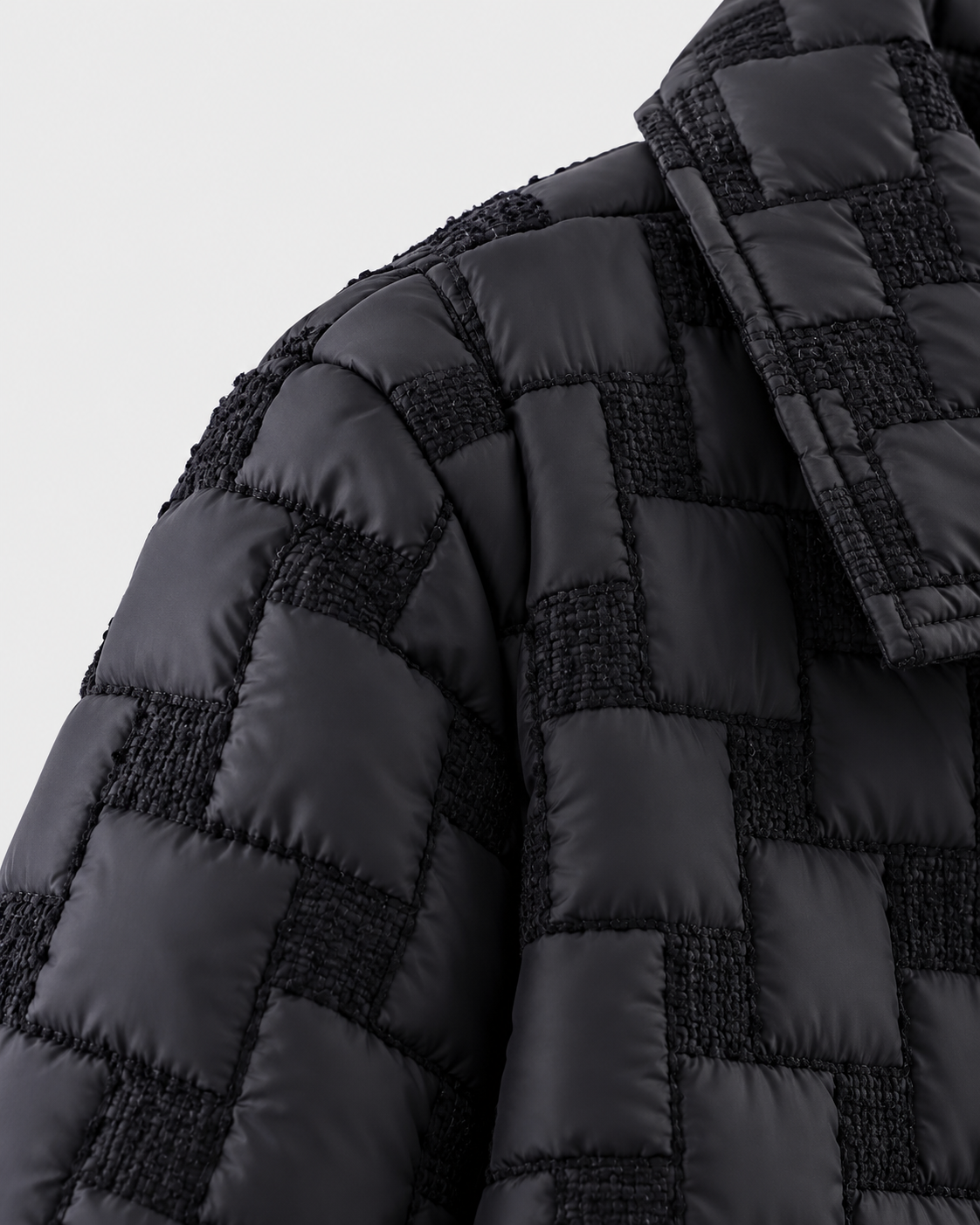 Image of Color: Black | Close-up of textured shoulder on women's black woven trench coat