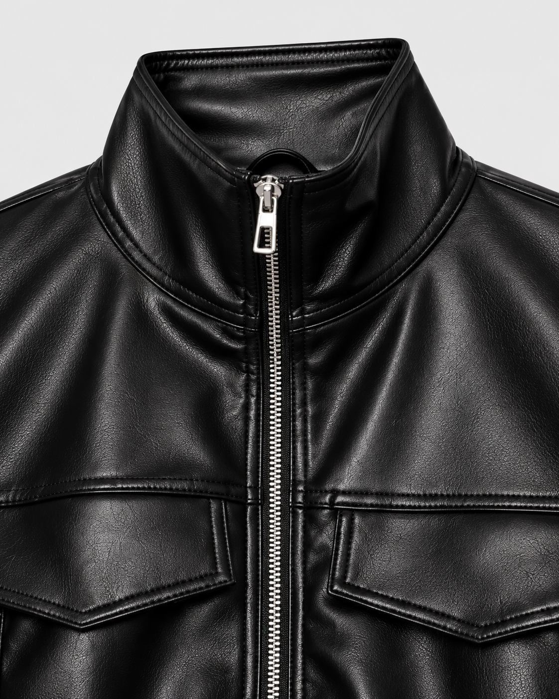 Color: Black | Stand collar and zipper detail on women's black faux leather jacket