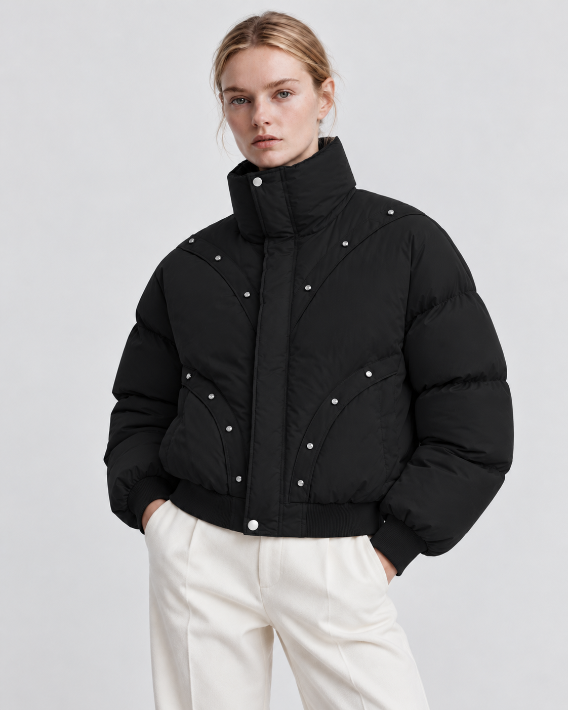 Image of Color: Black | Women's black stand collar quilted puffer jacket styled on model, front view