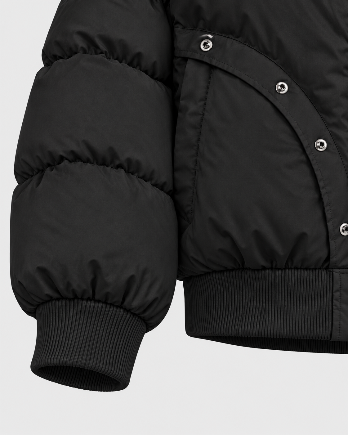 Image of Color: Black | Sleeve and ribbed cuff detail on women's black puffer jacket
