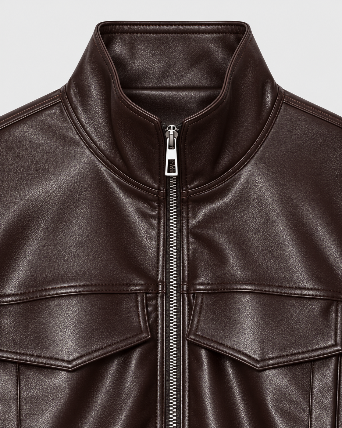 Image of Color: Brown | Stand collar and zipper detail on women's brown faux leather jacket