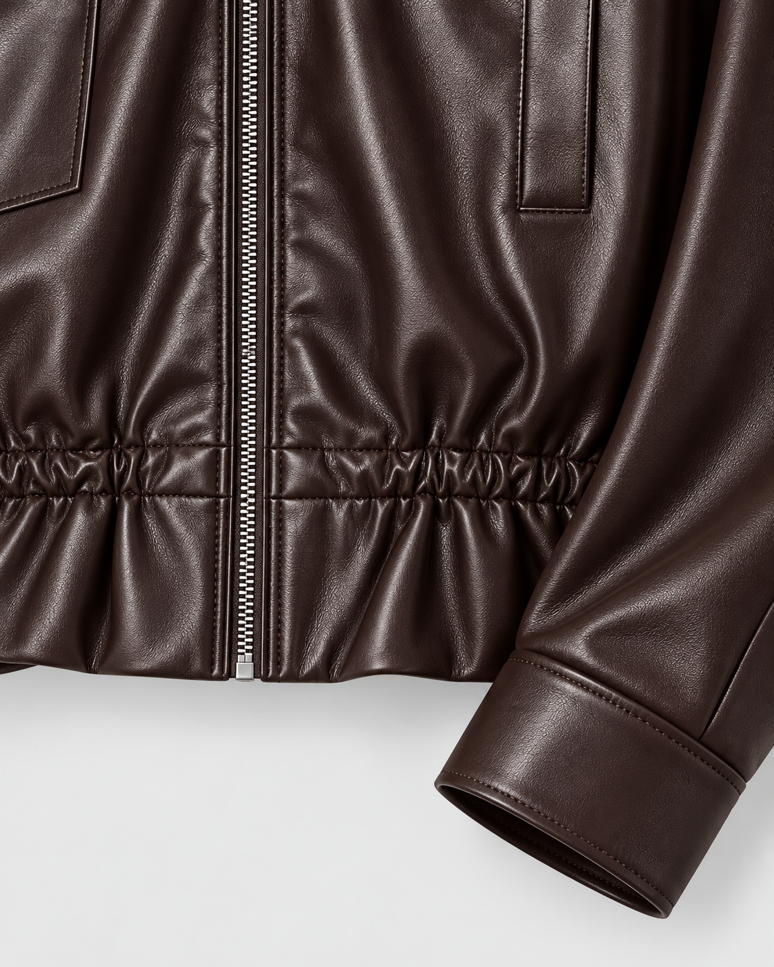 Image of Color: Brown | Elastic hem and cuff detail on women's brown faux leather jacket