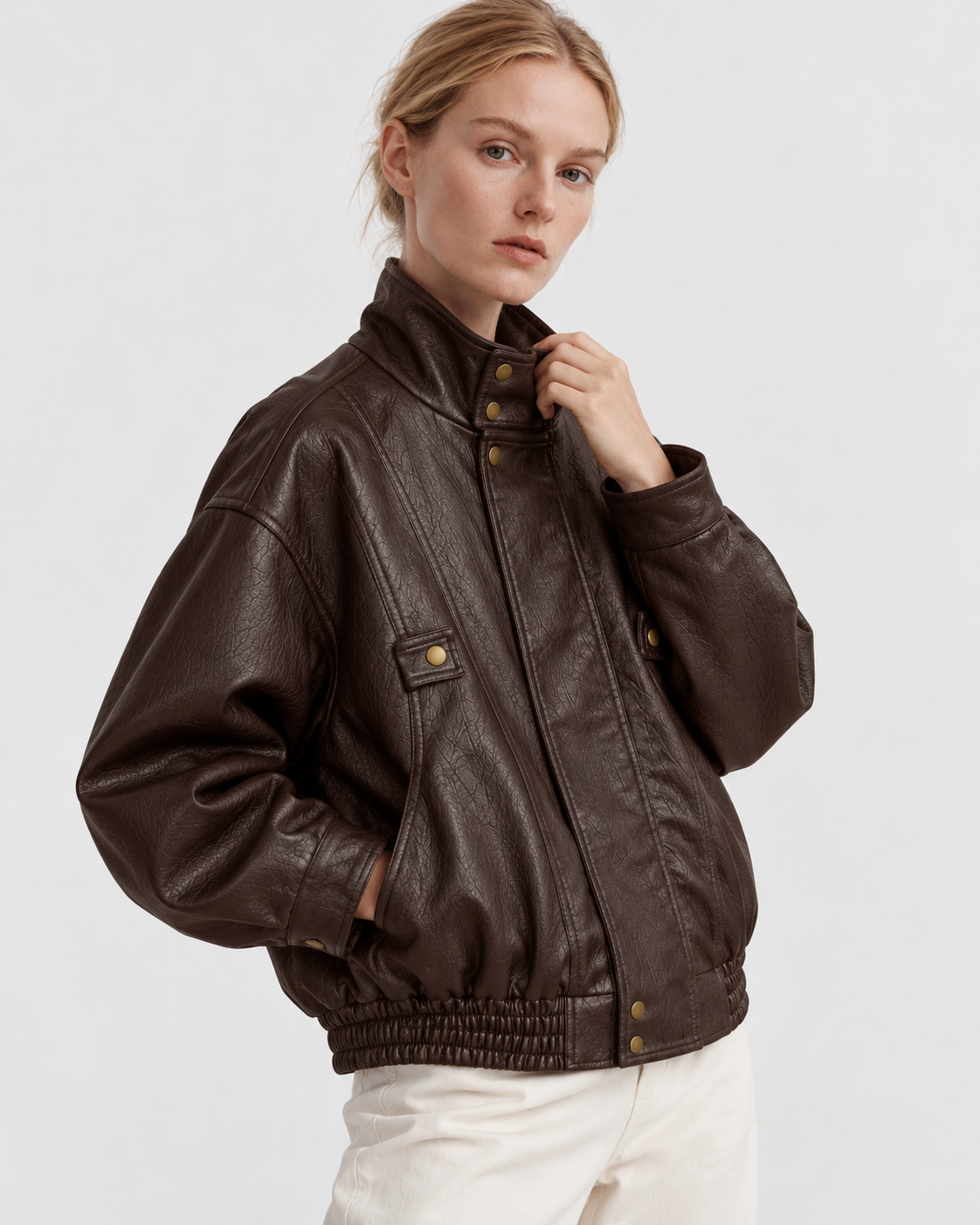 Image of Color: Brown | Women's brown washed faux leather zip-up jacket styled on model, look 2