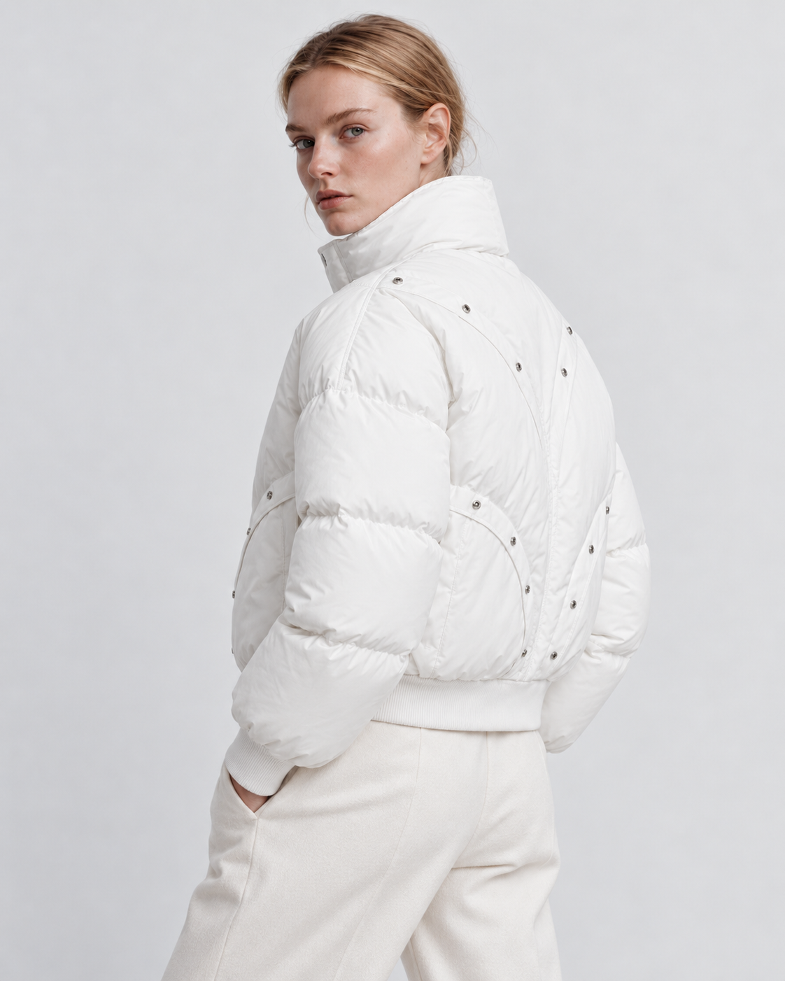 Color: White | Women's white stand collar quilted puffer jacket on model, back three-quarter view